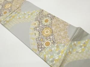 華紋に花唐草・角倉文模様織出し袋帯